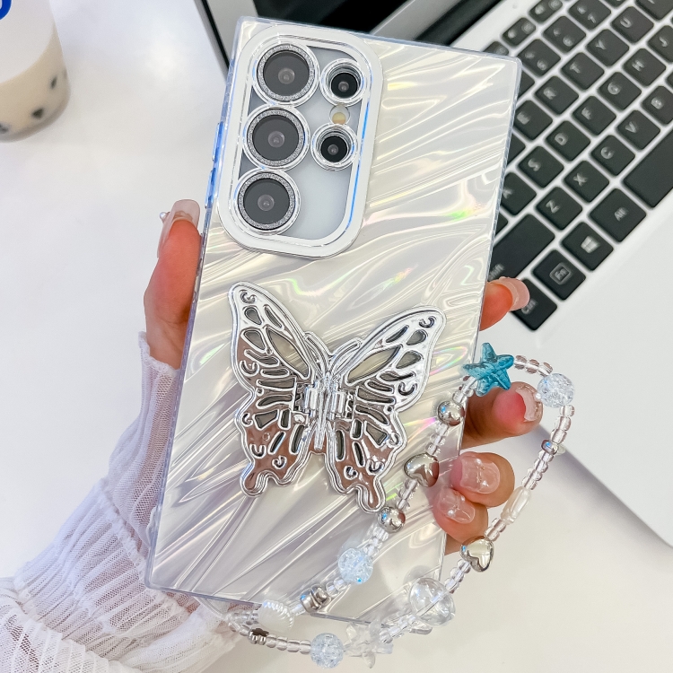 For Samsung Galaxy S25 Ultra 5G Plating Glitter Lens Film Texture Butterfly Holder Wristband Phone Case(White Water Ripples) 
For Samsung Galaxy S25 Ultra 5G Plating Glitter Lens Film Texture Butterfly Holder Wristband Phone Case(White Water Ripples)