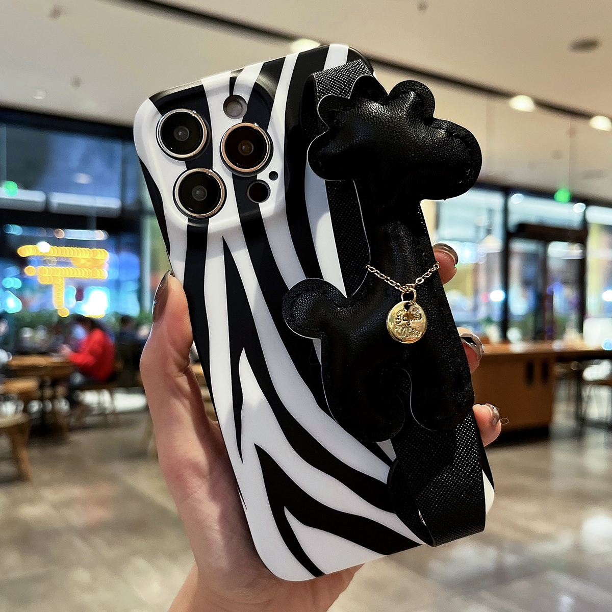 For iPhone 13 Pro Max Frosted Wrist Band TPU Phone Case(Zebra Texture) - Shopkiz.com