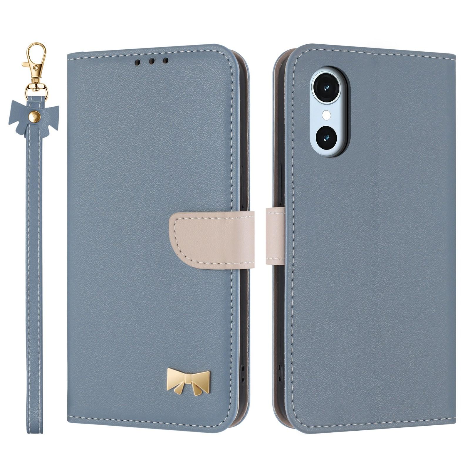 For Fujitsu Arrows We3 Metal Bow Leather Phone Case with Hand Strap(Light Blue) - Shopkiz.com