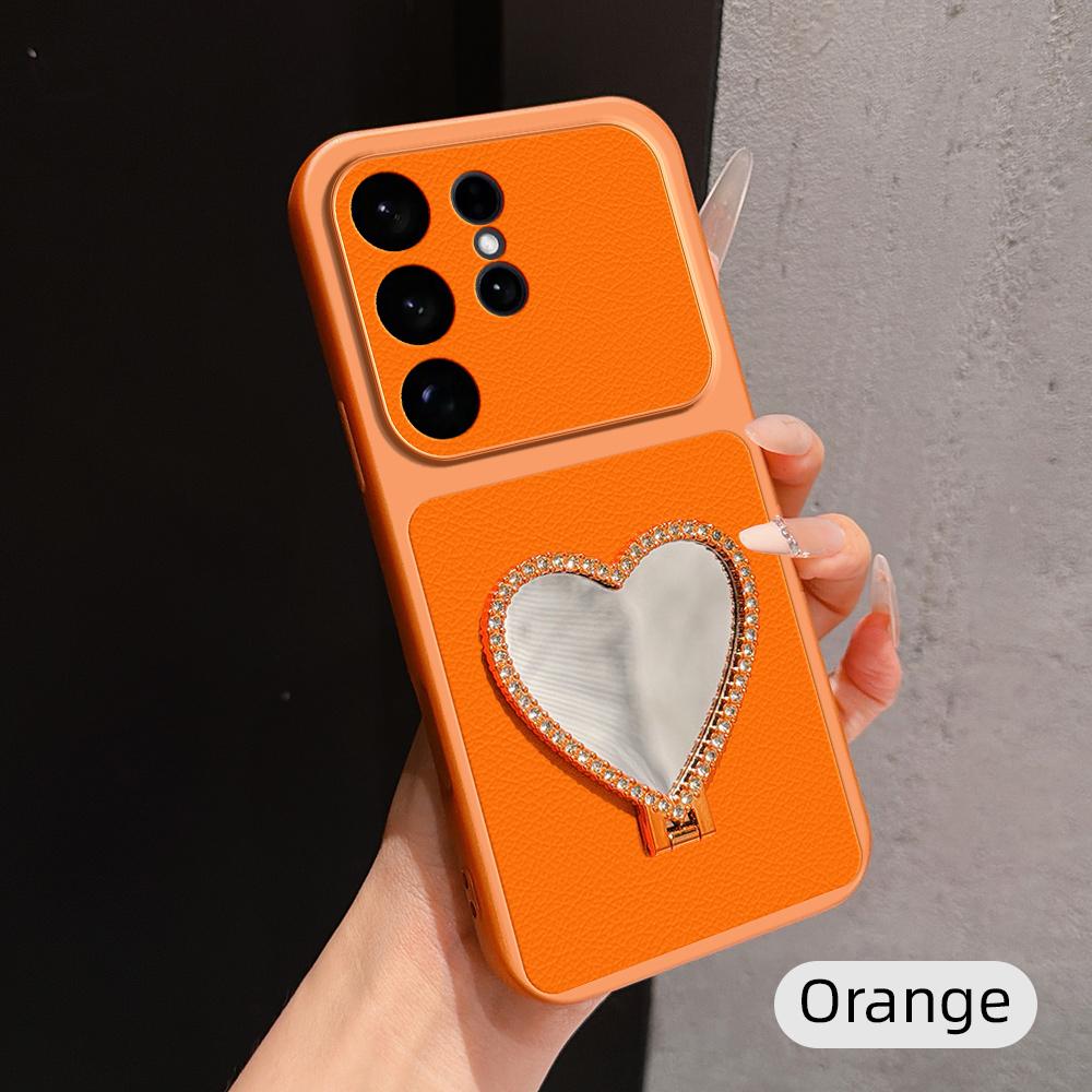 For Galaxy S26 Ultra 5G Lambskin Series Skin Feel Shockproof Phone Case with Heart Mirror Holder(Orange) - Shopkiz.com