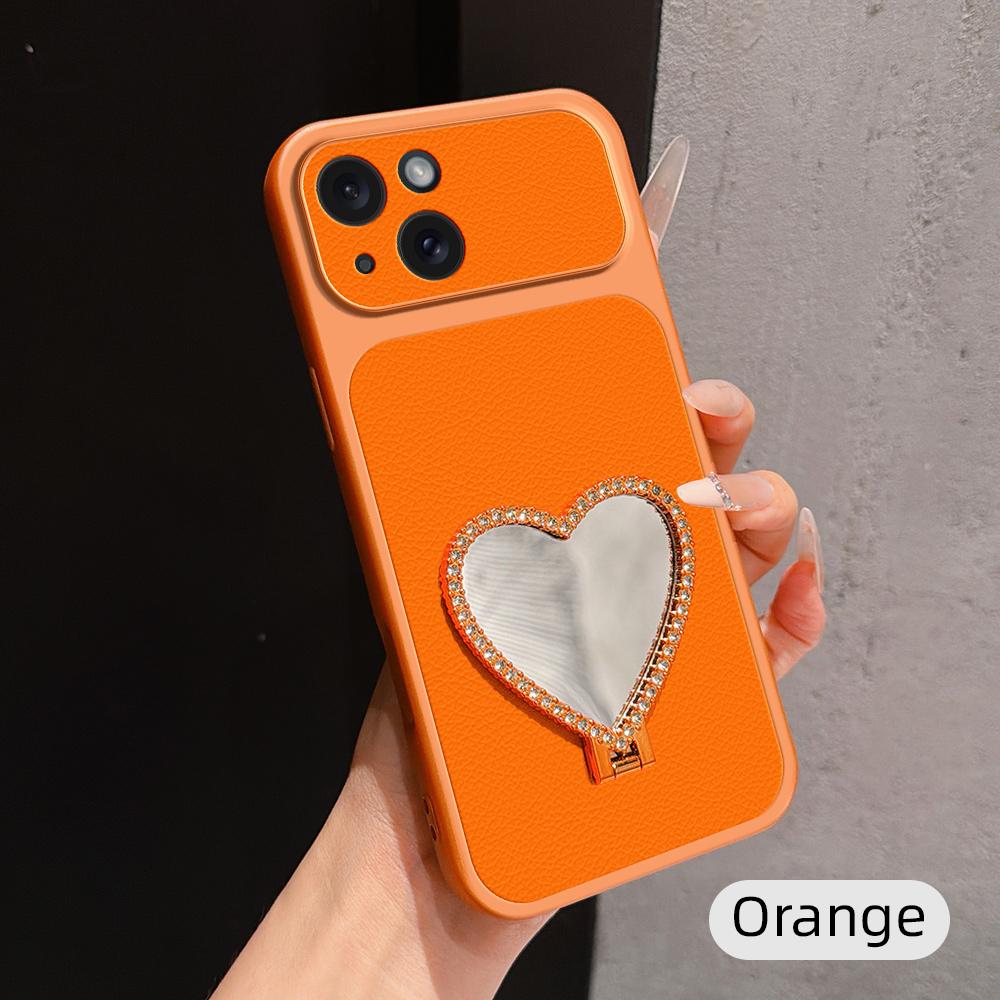 For iPhone 15 Lambskin Series Skin Feel Shockproof Phone Case with Heart Mirror Holder(Orange) - Shopkiz.com