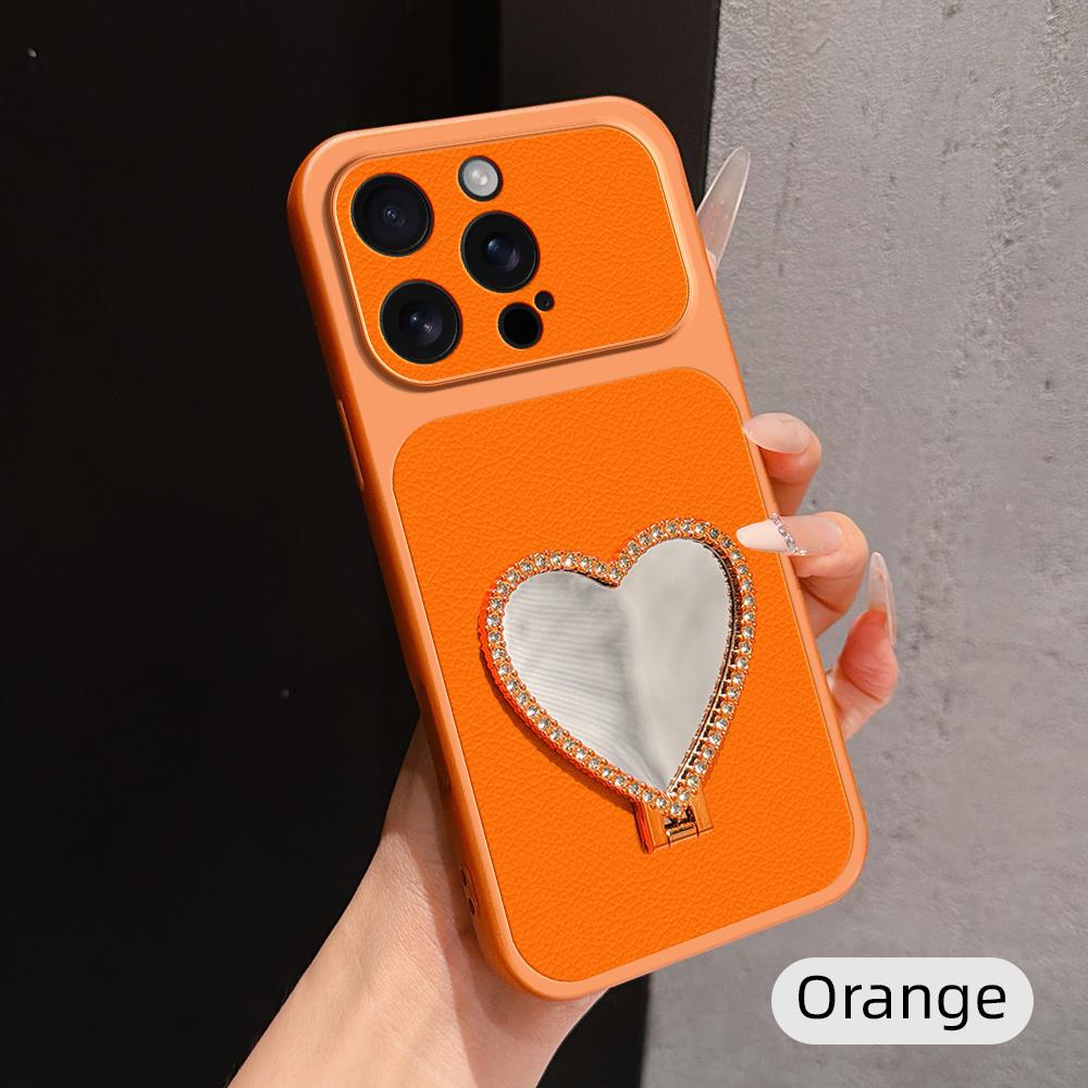 For iPhone 16 Pro Lambskin Series Skin Feel Shockproof Phone Case with Heart Mirror Holder(Orange) - Shopkiz.com