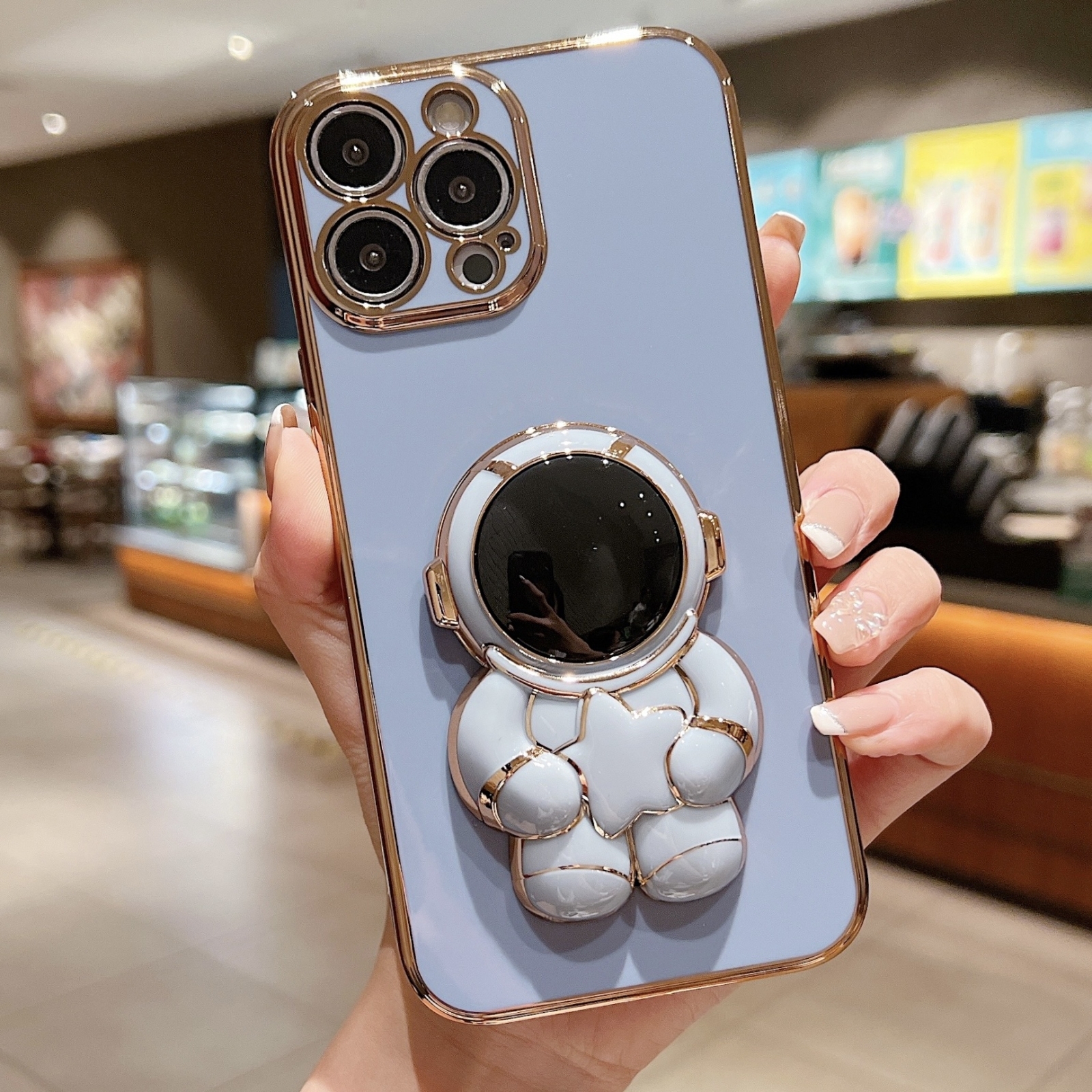 For iPhone 15 Pro Embrace Stars Electroplating Astronaut Holder Phone Case(Blue) - Shopkiz.com