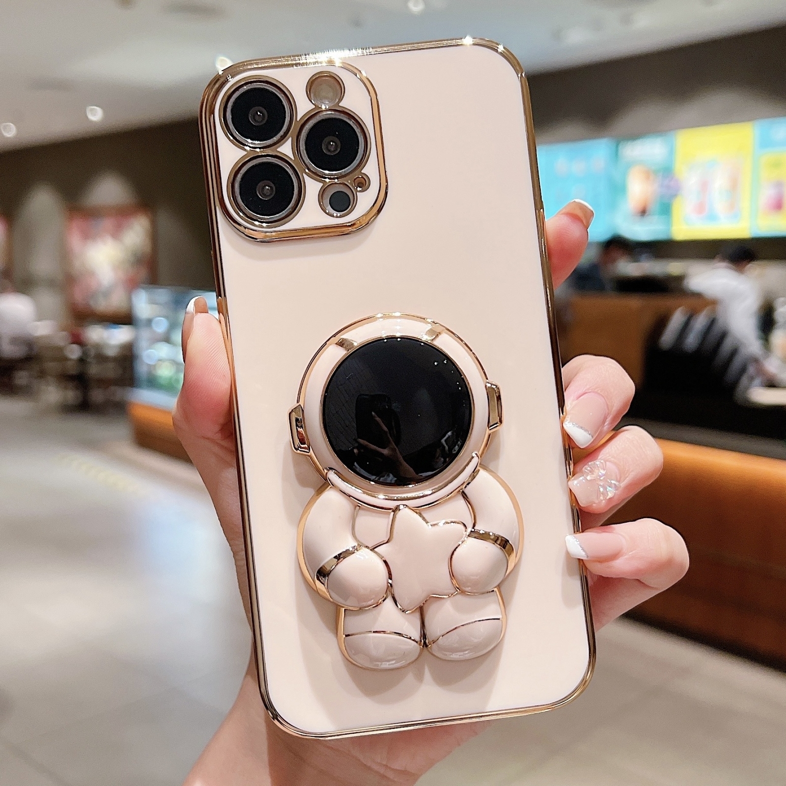 For iPhone 13 Pro Embrace Stars Electroplating Astronaut Holder Phone Case(Pink) - Shopkiz.com
