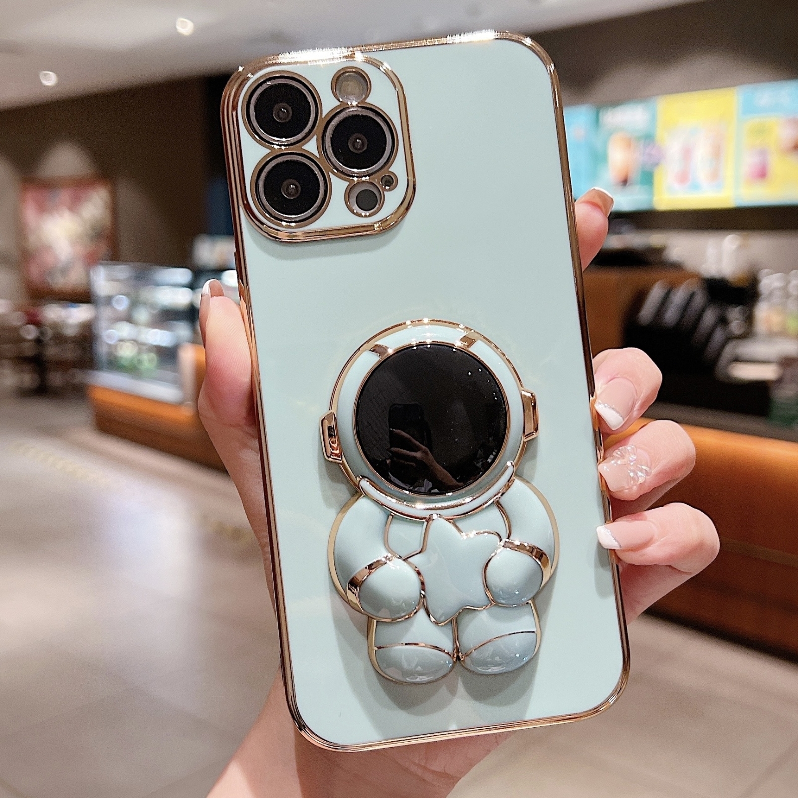 For iPhone 13 Pro Embrace Stars Electroplating Astronaut Holder Phone Case(Green) - Shopkiz.com