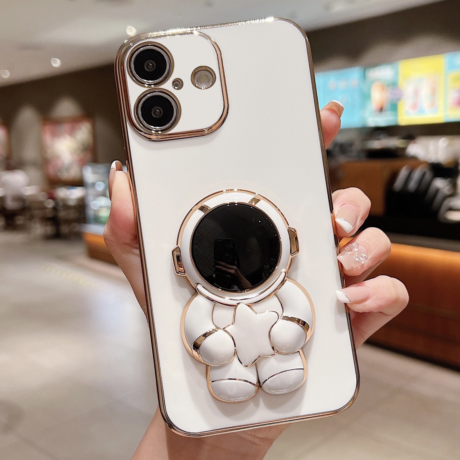 For iPhone 16 Plus Embrace Stars Electroplating Astronaut Holder Phone Case(White) - Shopkiz.com