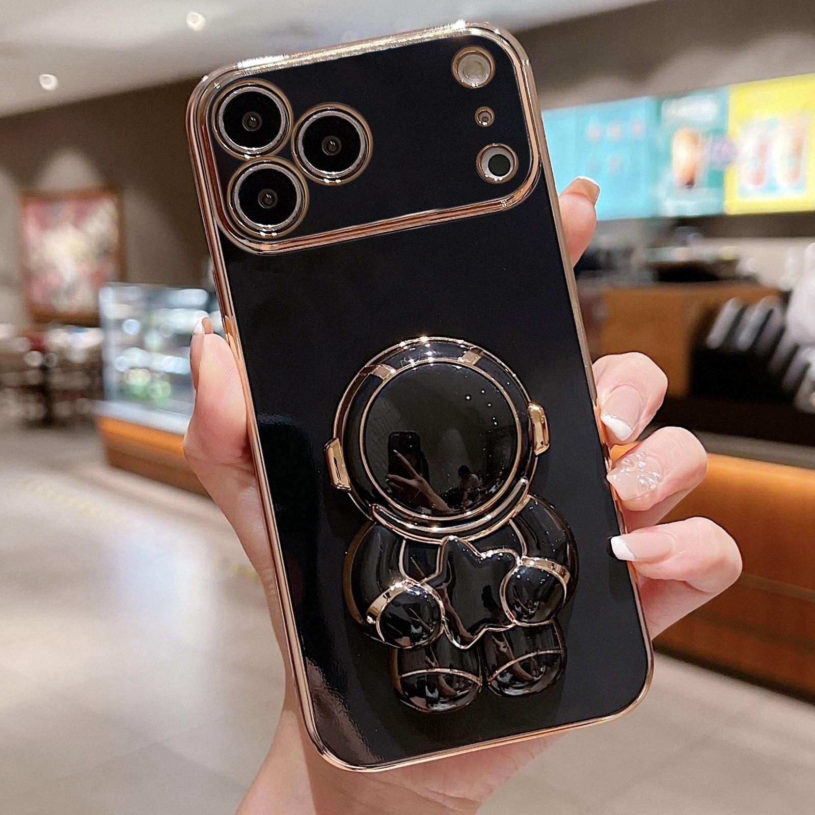 For iPhone 17 Pro Max Embrace Stars Electroplating Astronaut Holder Phone Case(Black) - Shopkiz.com