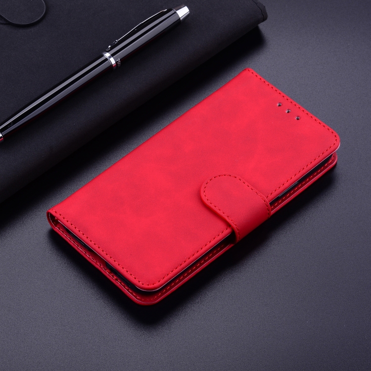 For iPhone 16 Plus Skin Feel Pure Color Flip Leather Phone Case(Red)