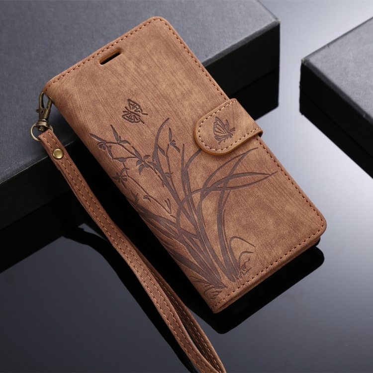 For Samsung Galaxy S24 Ultra 5G Orchid Butterfly Embossed Leather Phone Case(Brown)