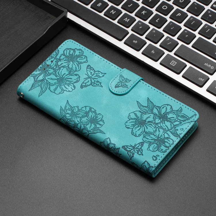 For iPhone 15 Plus Cherry Blossom Butterfly Skin Feel Embossed PU Phone Case(Green)