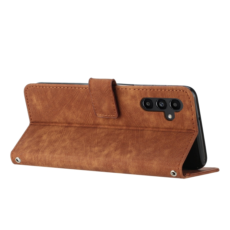 For Samsung Galaxy S25 / S24 5G Skin Feel Stripe Pattern Leather Phone Case with Long Lanyard(Brown) For Samsung Galaxy S25 / S24 5G Skin Feel Stripe Pattern Leather Phone Case with Long Lanyard(Brown)