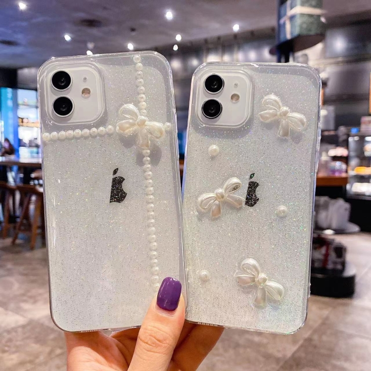 For iPhone 14 Pearl Bow Glitter Epoxy TPU Phone Case(Cross Knot)