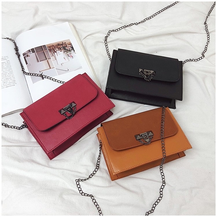 charles and keith turn lock crossbody bolsa