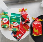 100 PCS 크리스마스 선물 가방 사탕 비스킷 졸라 매는 끈 번들 크리스마스 쿠키 가방, 무작위 패턴 배달