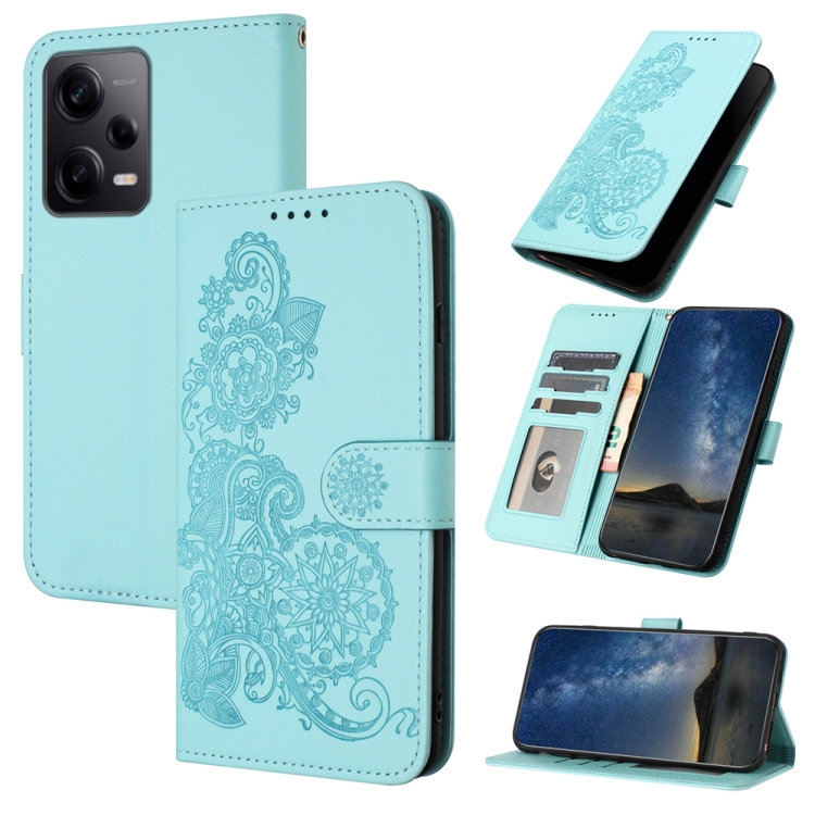 

For Xiaomi Redmi Note 12 Pro Datura Flower Embossed Flip Leather Phone Case(Light blue)