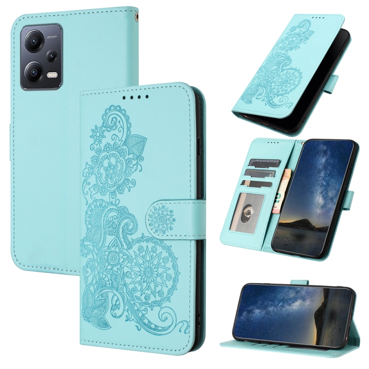 

For Xiaomi Redmi Note 12 5G Global Datura Flower Embossed Flip Leather Phone Case(Light blue)