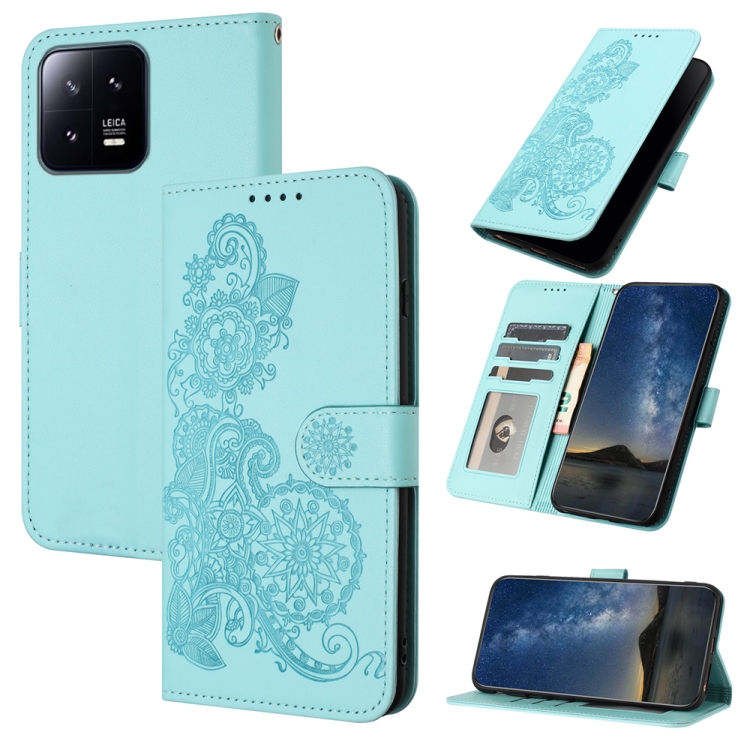 

For Xiaomi 13 Pro Datura Flower Embossed Flip Leather Phone Case(Light blue)