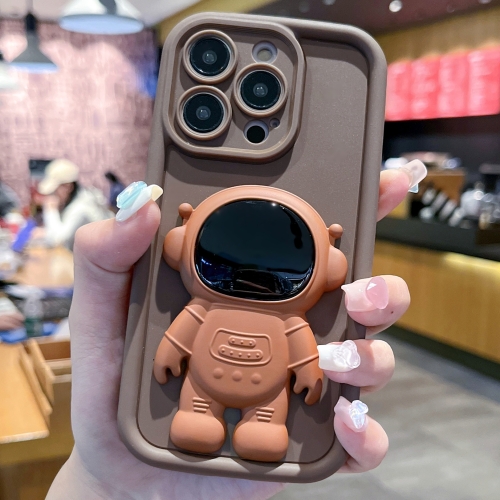

For iPhone 15 Pro Astronaut 3D Relief Holder TPU + PC Full Coverage Phone Case(Brown)