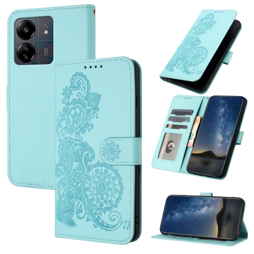

For Xiaomi Redmi 13C Datura Flower Embossed Flip Leather Phone Case(Light blue)