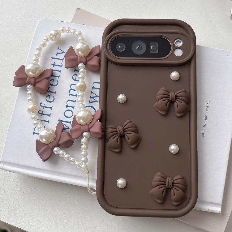 

For Google Pixel 9 Pro XL Soft Silicone 3D Bowknot Pearl Phone Case with Beaded Wrist Strap(Coffee)