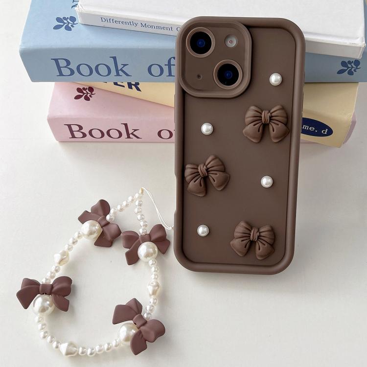 

For iPhone 15 Soft Silicone 3D Bowknot Pearl Phone Case with Beaded Wrist Strap(Coffee)