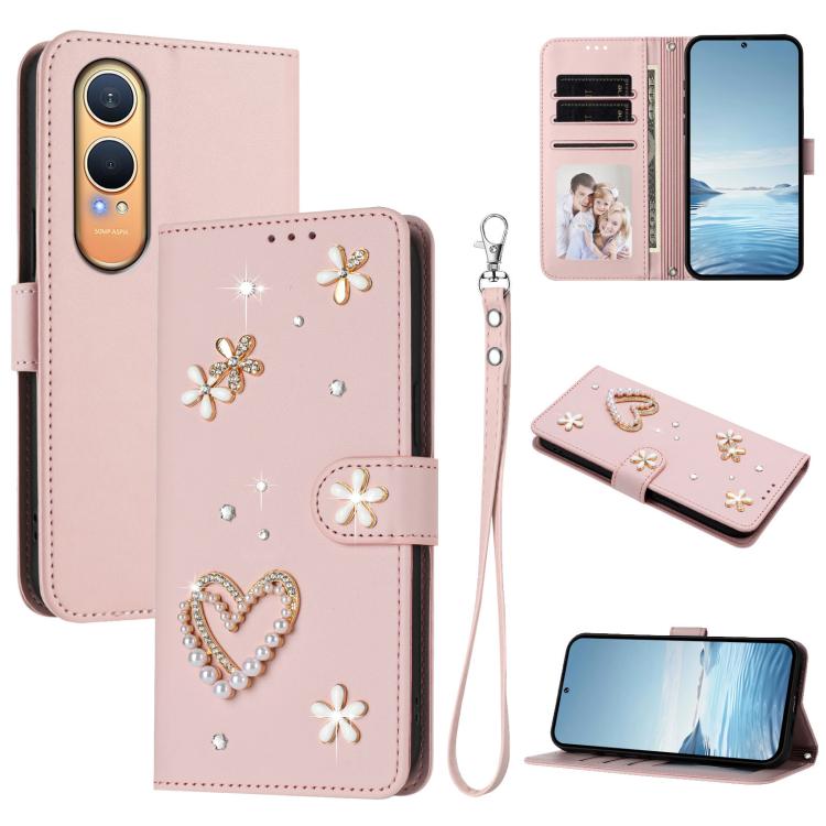 

For OnePlus Nord CE4 Lite 5G Global ZS01 Double-Layer Heart Floral Vegan Leather Phone Case with Wrist Strap(Pink)