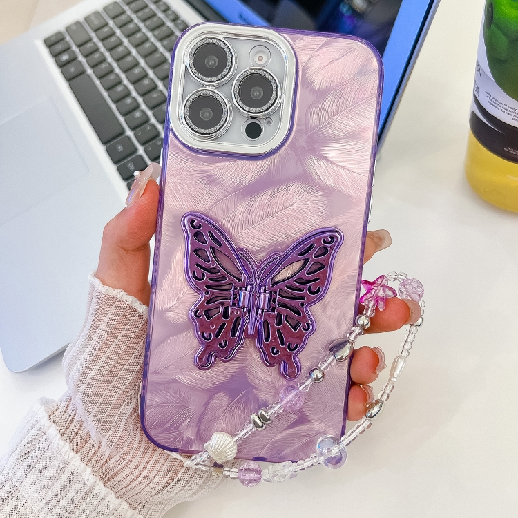 

For iPhone 16 Pro Plating Glitter Lens Film Texture Butterfly Holder Wristband Phone Case(Purple Feathers)