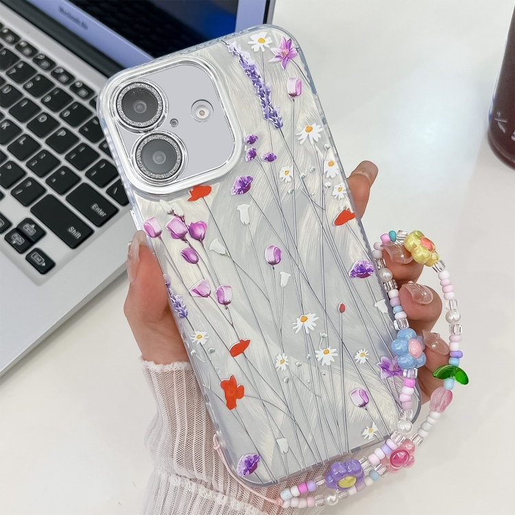 

For iPhone 16 Plus Electroplating Flower Texture Wristband TPU Phone Case(Purple Wildflowers SH1)