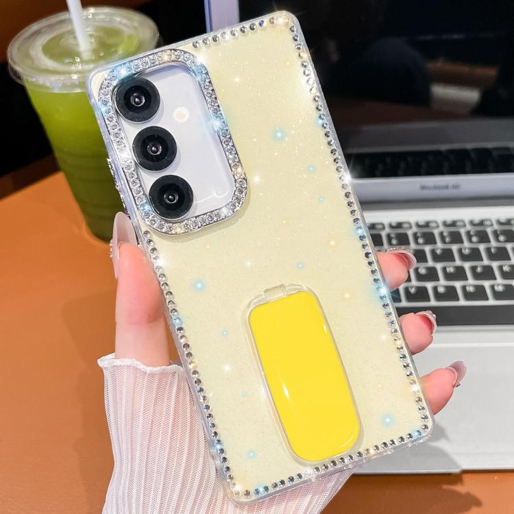 

For Samsung Galaxy S24 5G Rhinestone Glitter TPU 4-corners Anti-fall Phone Case with Holder(Light Yellow)