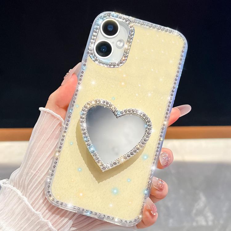 

For iPhone 16 Diamond Glitter Mirror Heart Holder Phone Case(Light Yellow)
