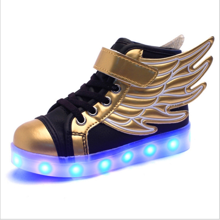 gold trainers with wings