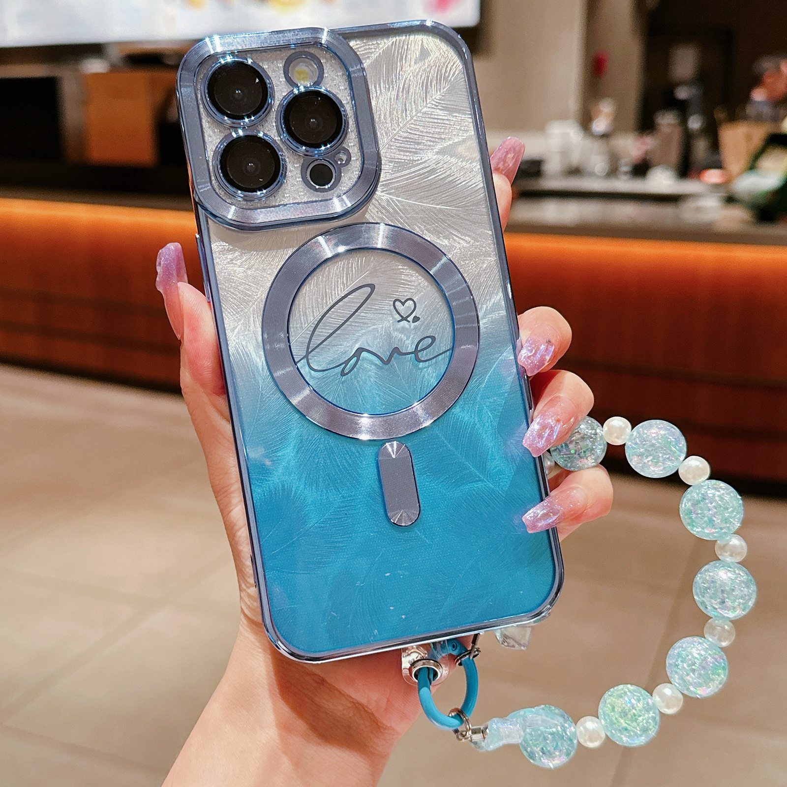For iPhone 15 Pro Dual-Love Feather Gradient Glitter Bracelets Magsafe TPU Phone Case(Blue) For iPhone 15 Pro Dual-Love Feather Gradient Glitter Bracelets Magsafe TPU Phone Case(Blue)