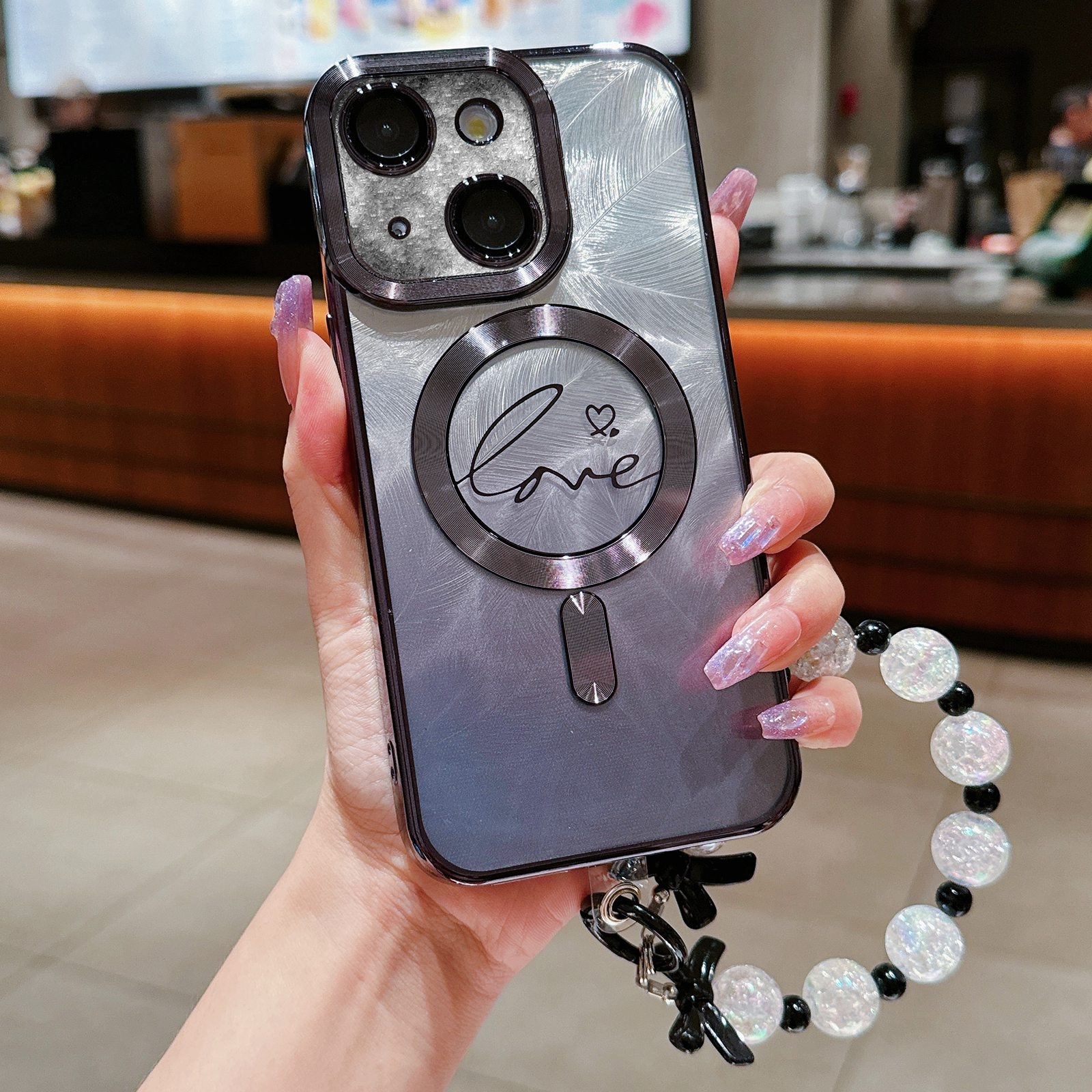 For iPhone 14 Plus Dual-Love Feather Gradient Glitter Bracelets Magsafe TPU Phone Case(Black) For iPhone 14 Plus Dual-Love Feather Gradient Glitter Bracelets Magsafe TPU Phone Case(Black)